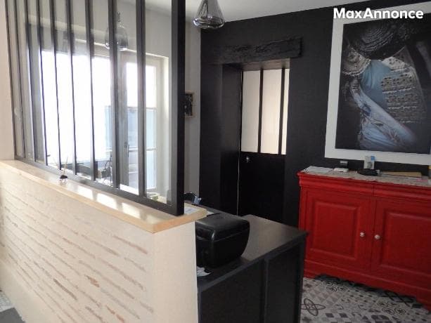 Maison en RDC d'un grand séjour 